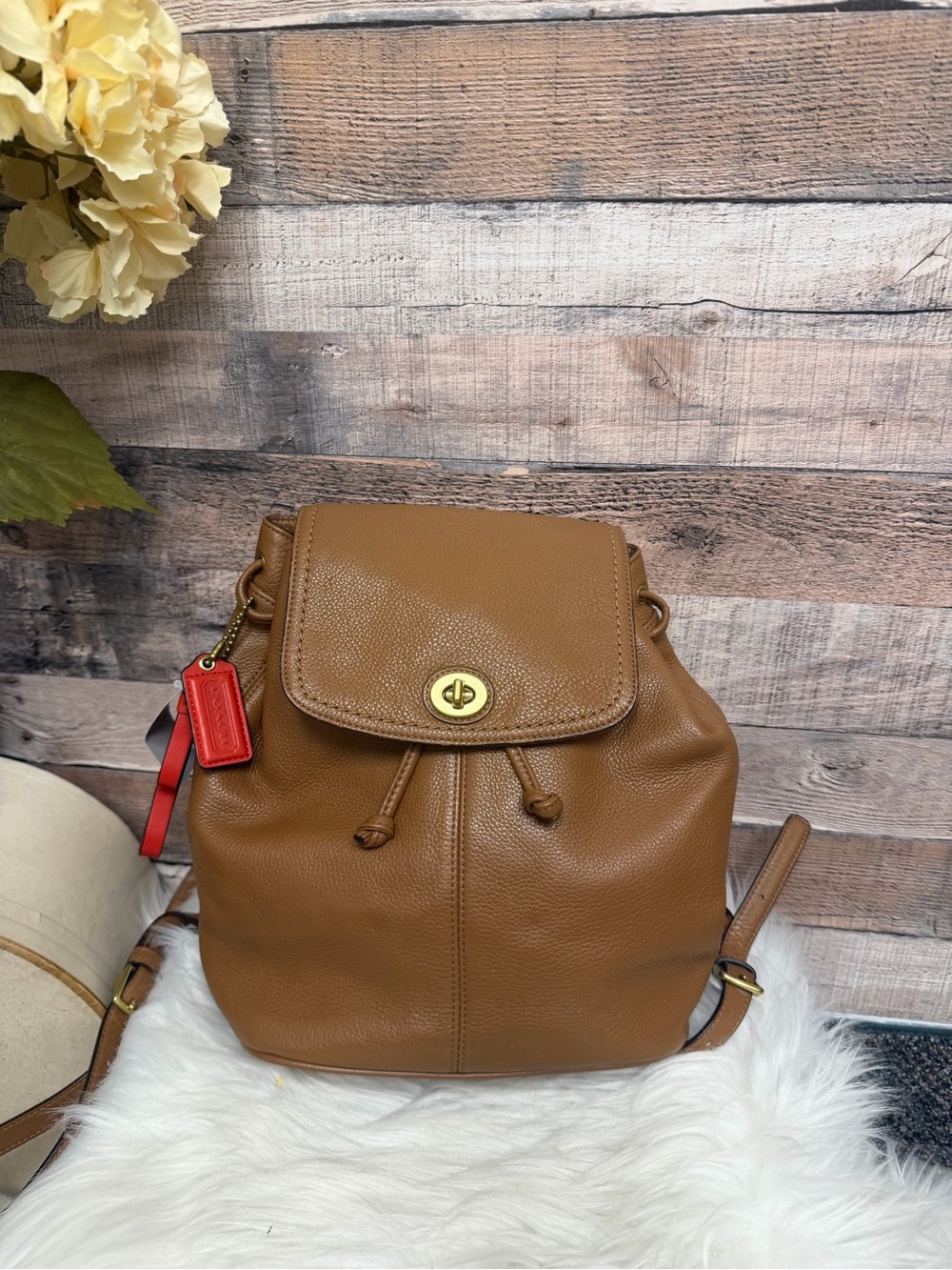 Coach Tan Pebble Leather Drawstring Backpack with Red Tag